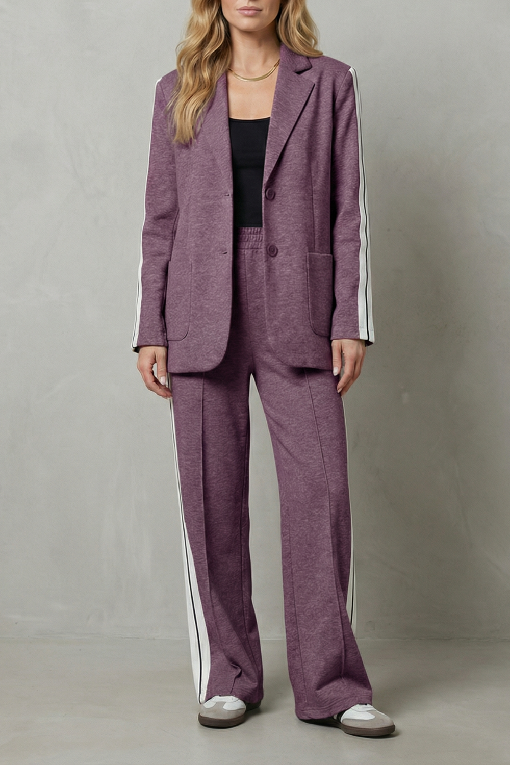 Suit set styled with heels and a sleek top for smart-casual wear