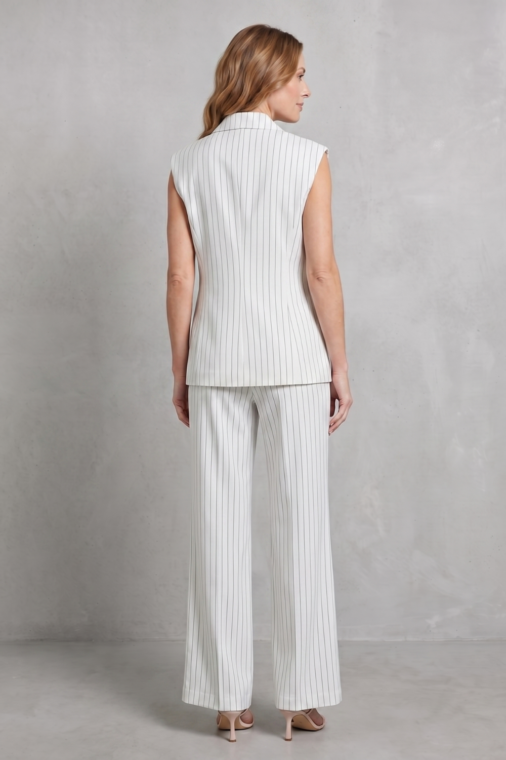 White pinstripe colorway of the vest and pants suit set, full-length view