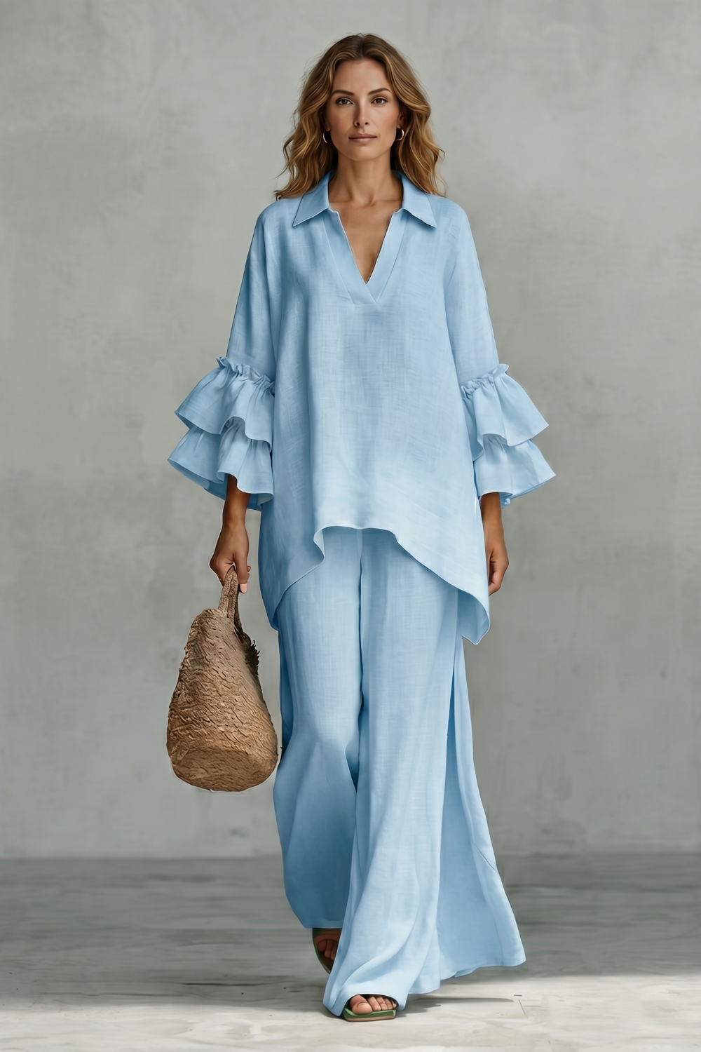 Close-up of the flowing wide-leg pants and their soft drape