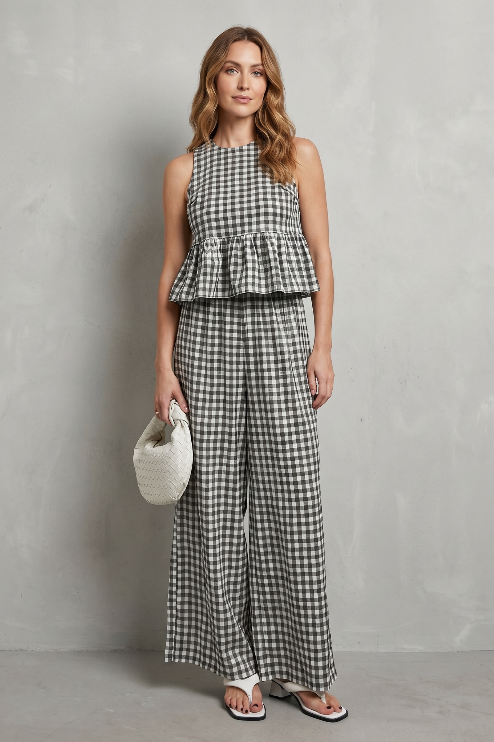Side view of the gingham ruffle top and wide-leg pants set