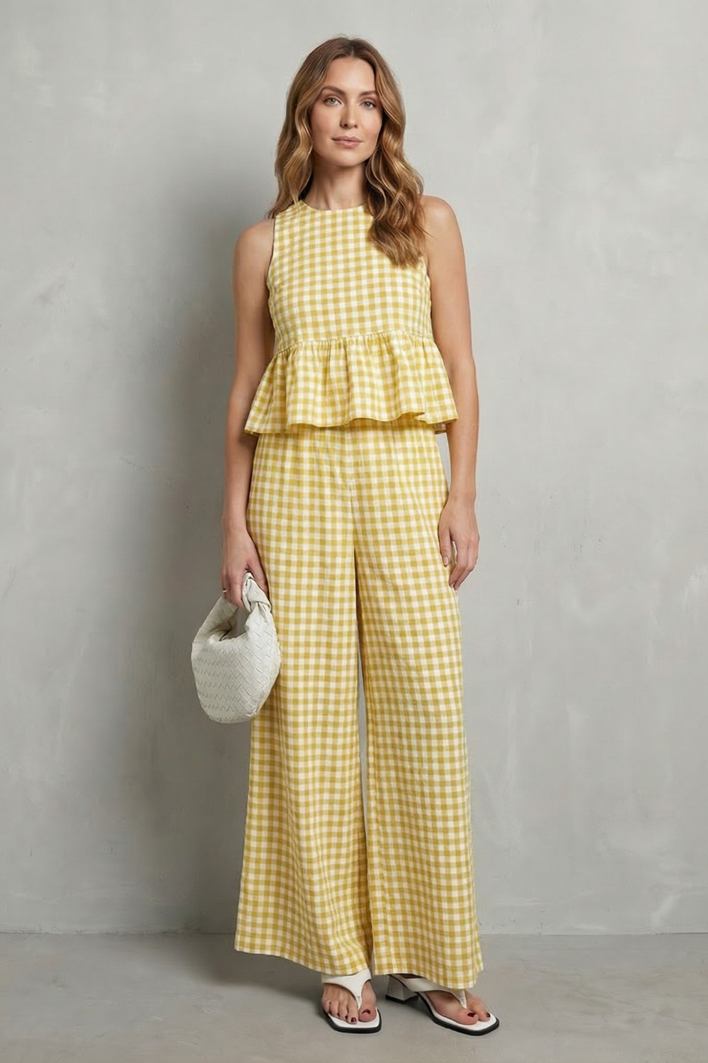 Yellow colorway of the sleeveless gingham ruffle top and pants set