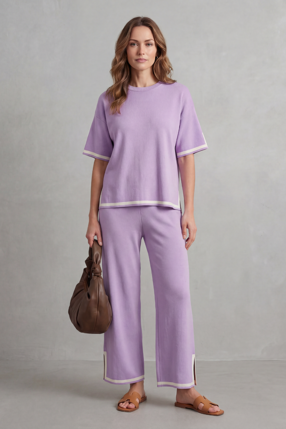 Sky blue colorway of the contrast-trim rib-knit top and wide-leg pants set