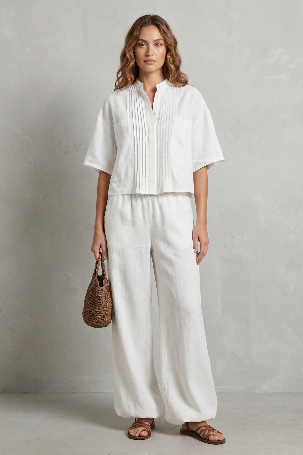White colorway of the pleated wide-leg pants set, full-length view