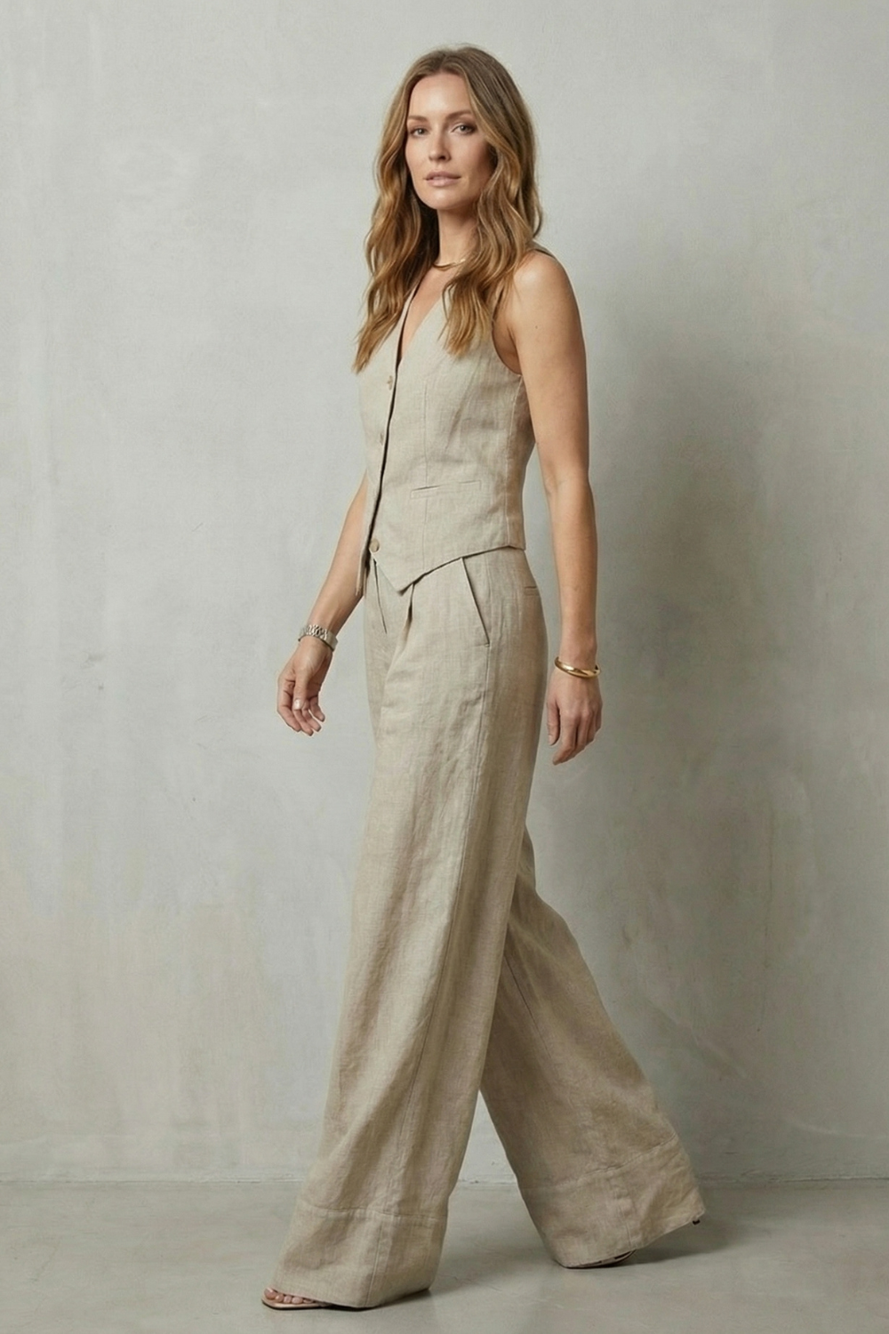 Women's sleeveless tailored vest and wide-leg pants set, back view