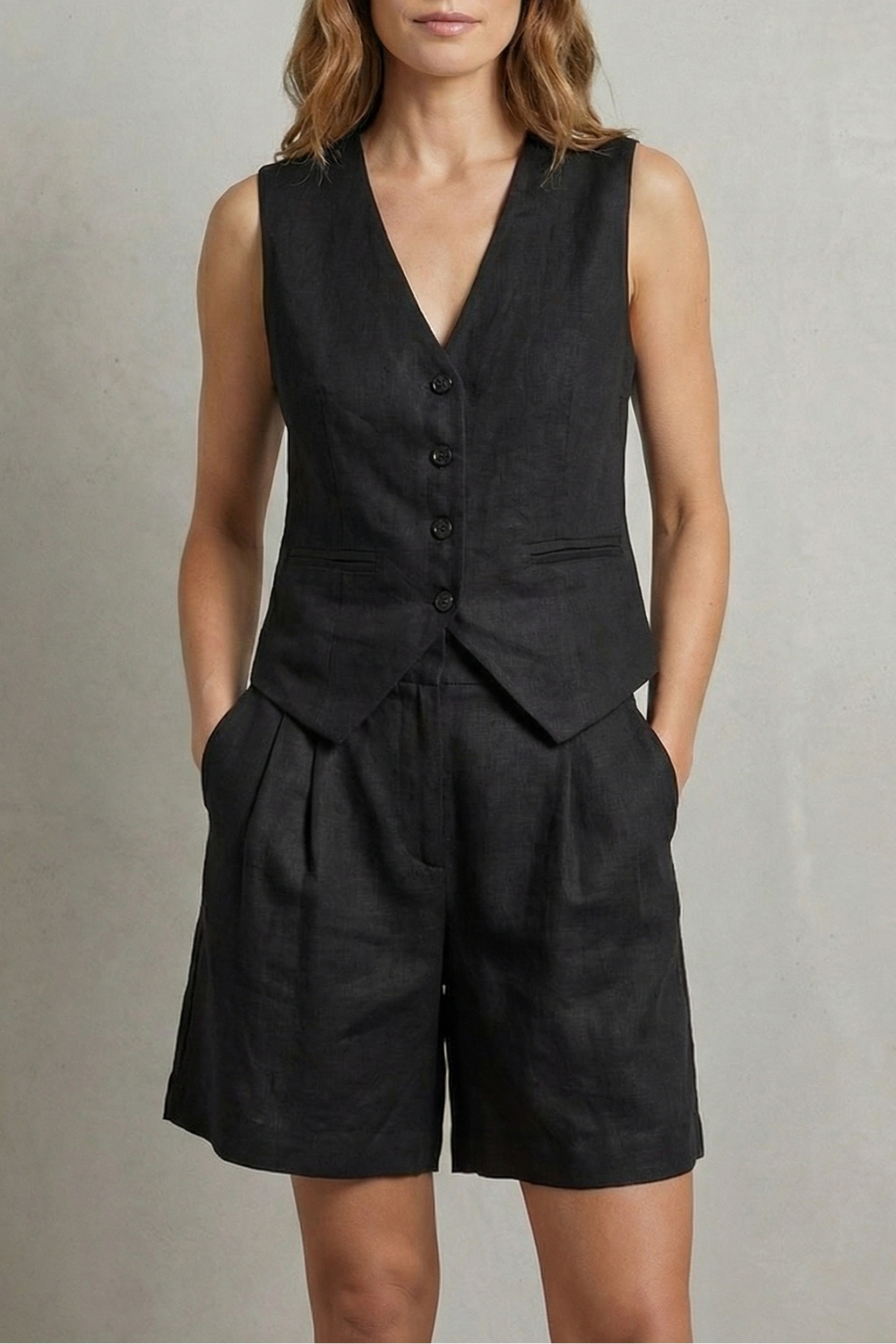 Light Blue colorway of the V-neck vest and shorts set, full-length view