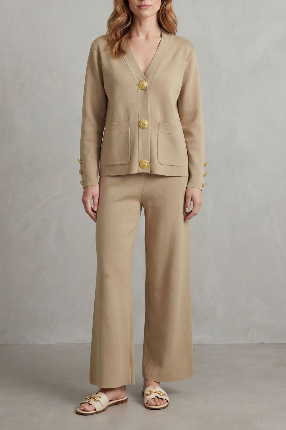 Detail of the patch front pockets and buttoned sleeve cuff