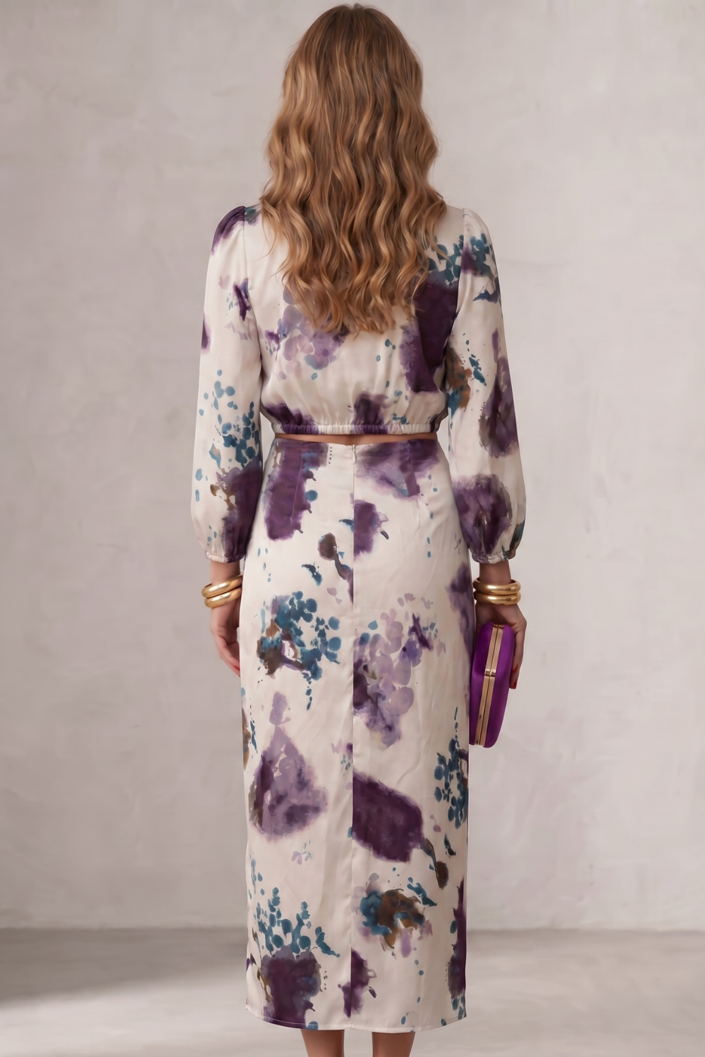 Purple colorway of the wrap blouse and maxi skirt set, full-length view