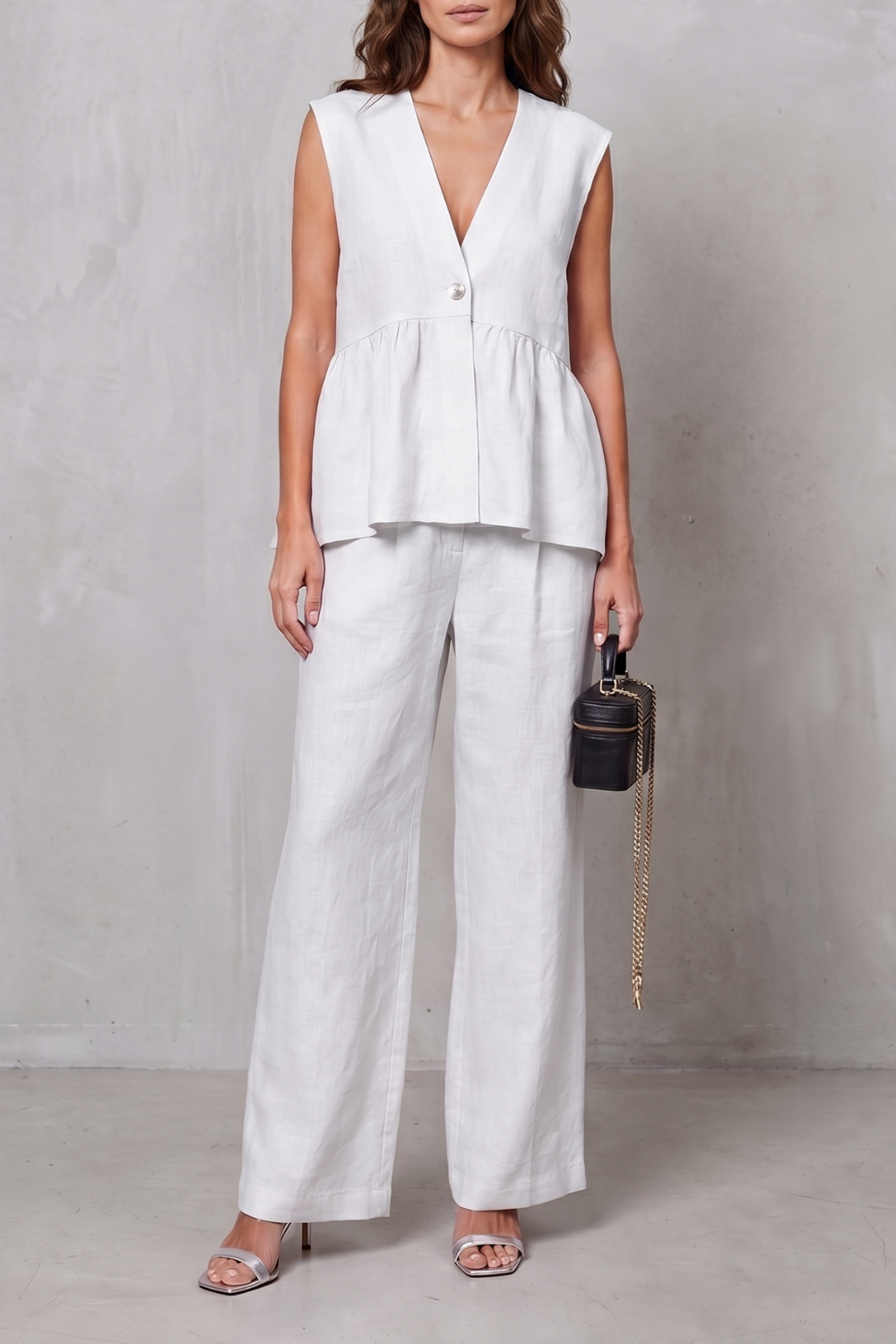 Blue colorway of the V-neck peplum top and wide-leg pants set