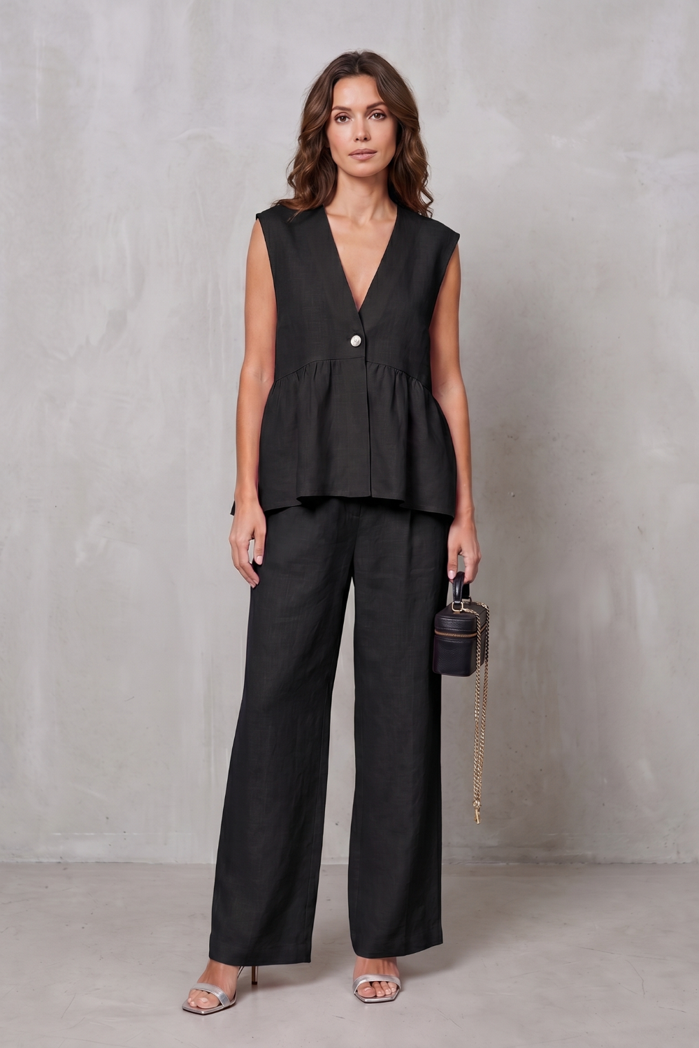 Apricot colorway, full-length view of the peplum two-piece set