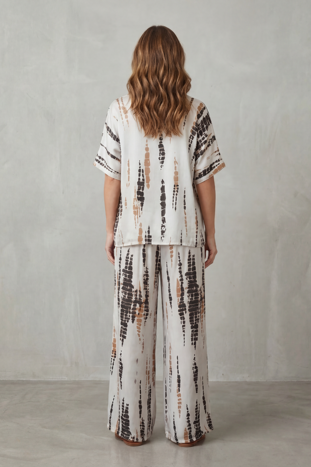 Detail close-up of the abstract print on the drop-shoulder top