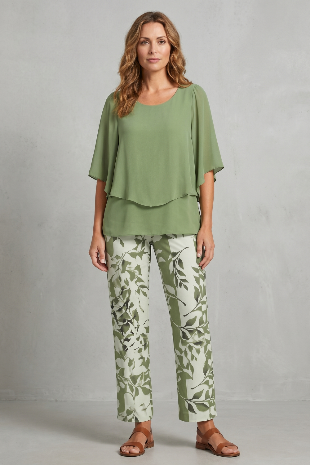Side view of the layered chiffon-effect top and botanical print pants