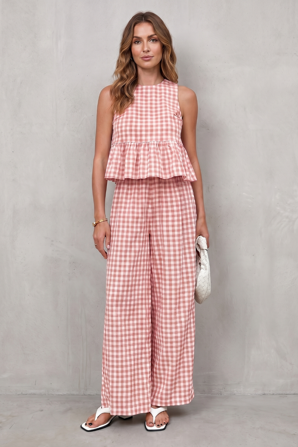 Sleeveless peplum top detail on the gingham two-piece set