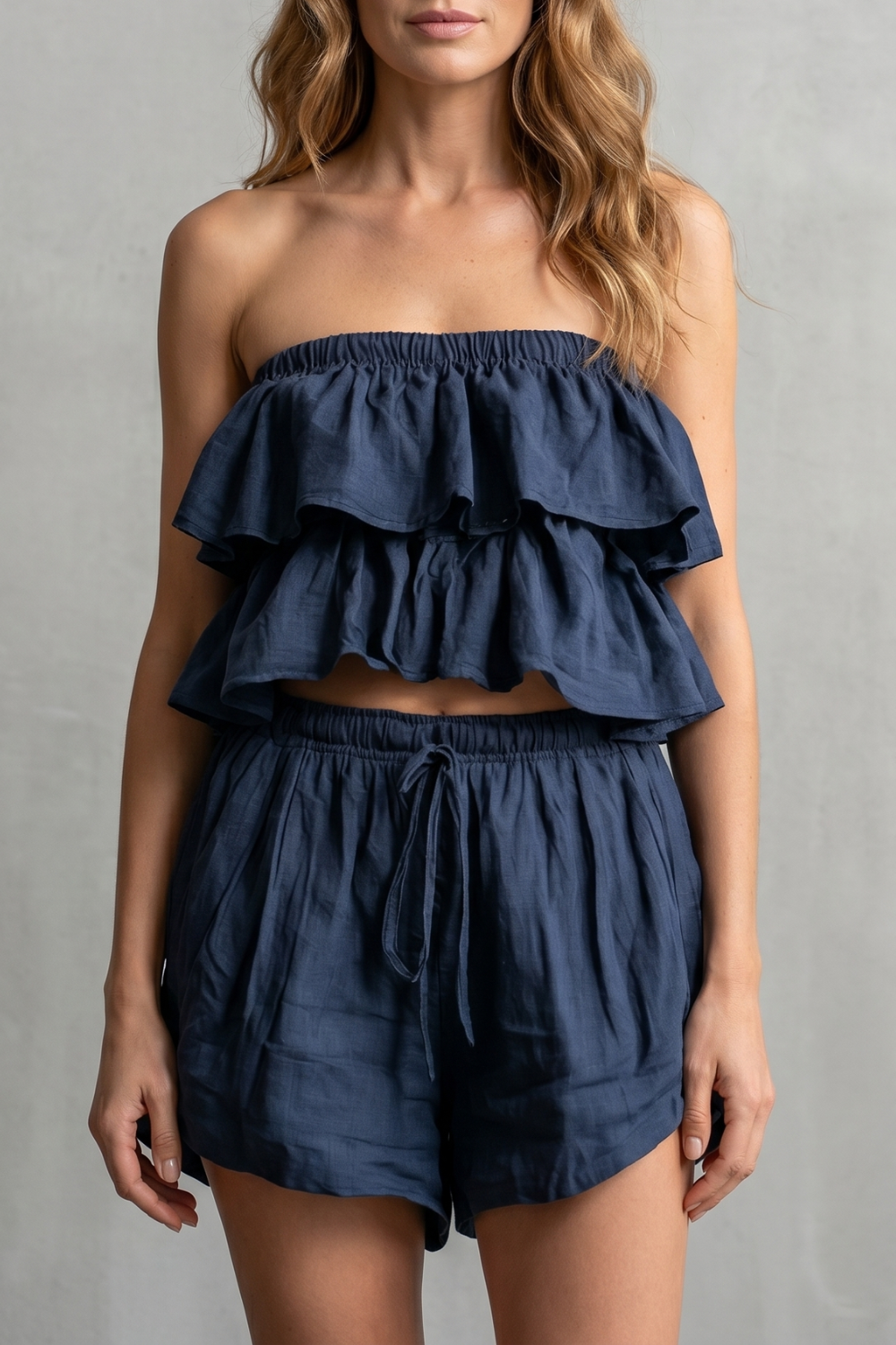 Women's ruffled bandeau top and relaxed shorts set, front view