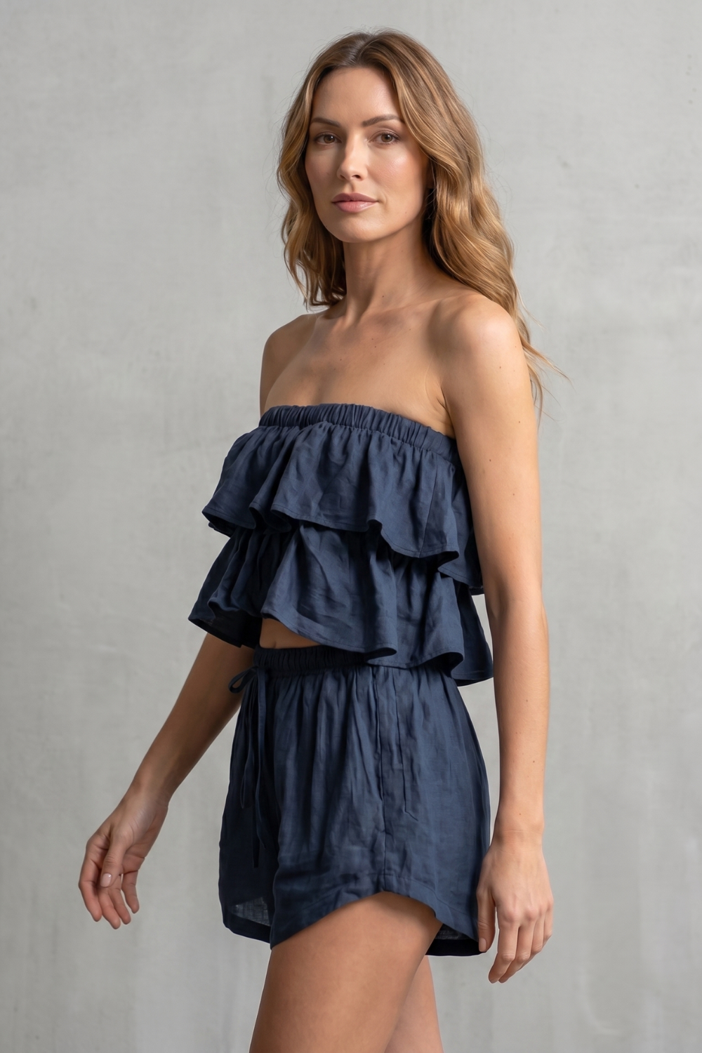 Back view of the two-piece ruffled bandeau top and shorts set