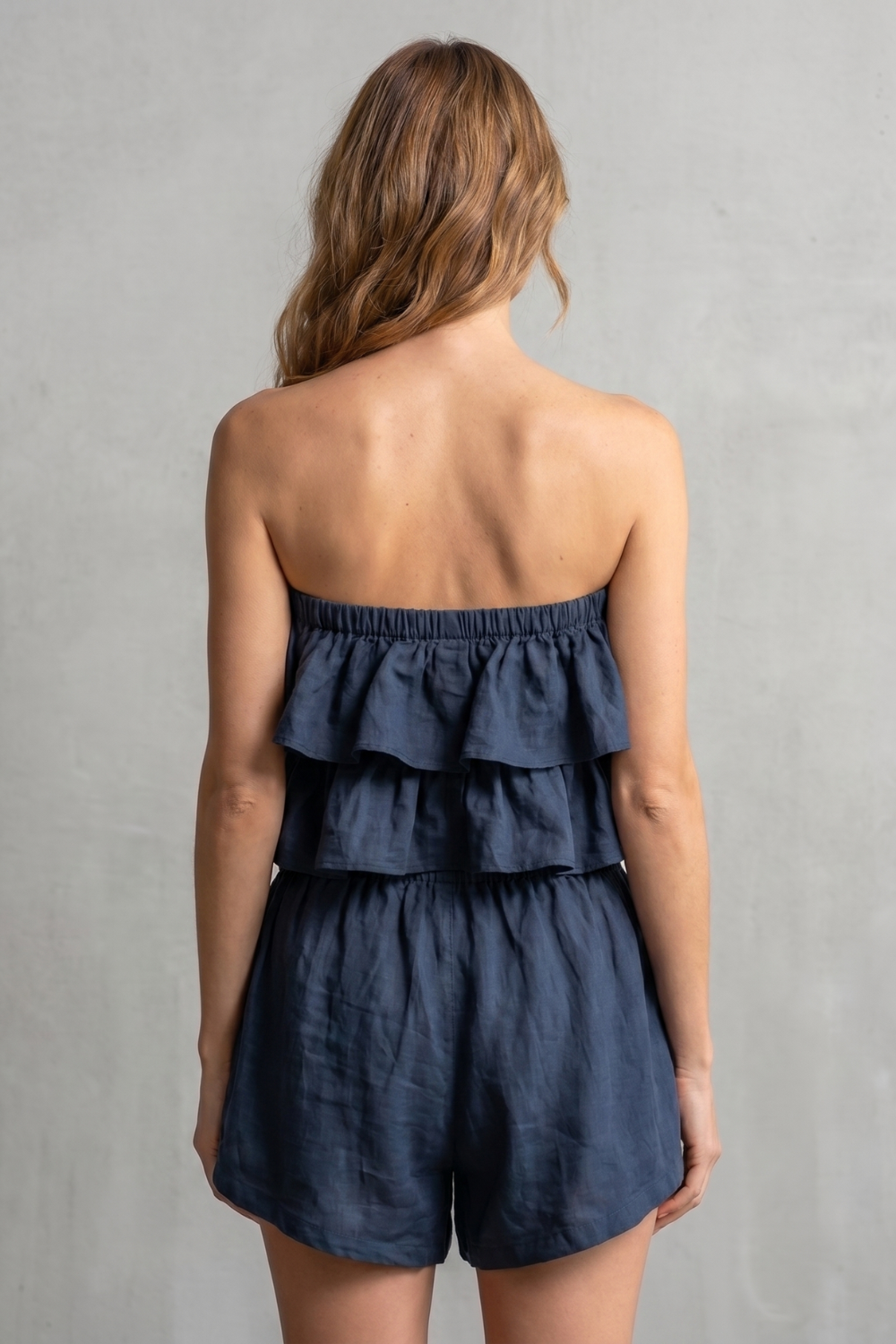 Detail close-up of the layered ruffles on the bandeau top