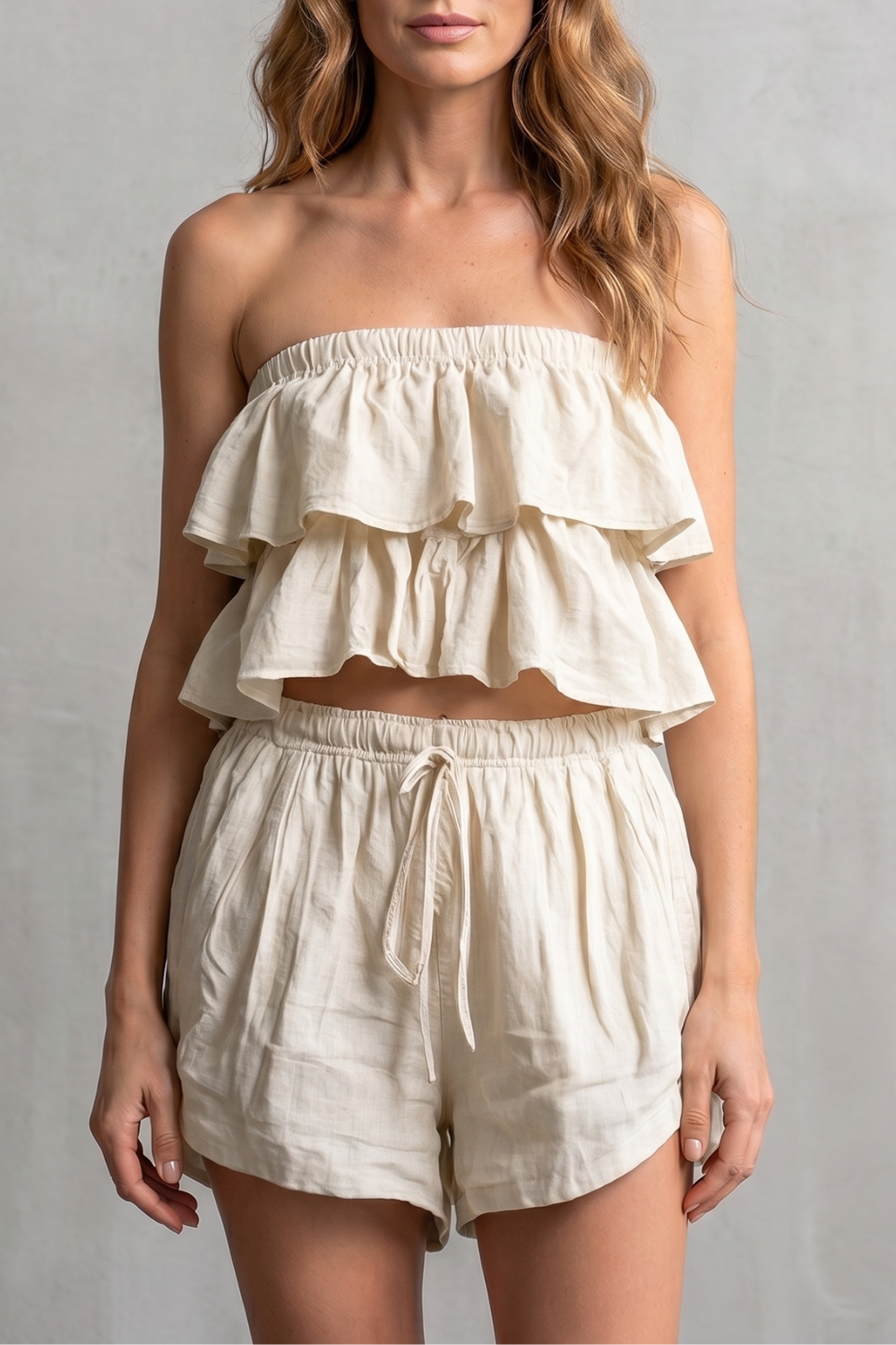 Detail of the elasticated drawstring waistband on the relaxed shorts