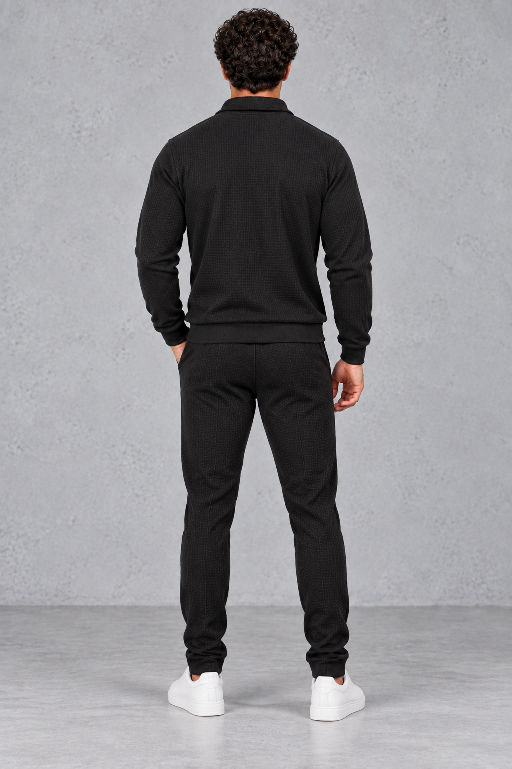 Styled casual look wearing the men's tracksuit with white sneakers