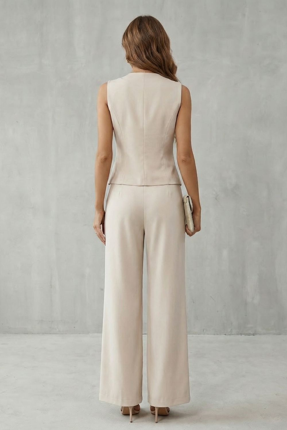 Detail close-up of the vest's tailored seams and front closure