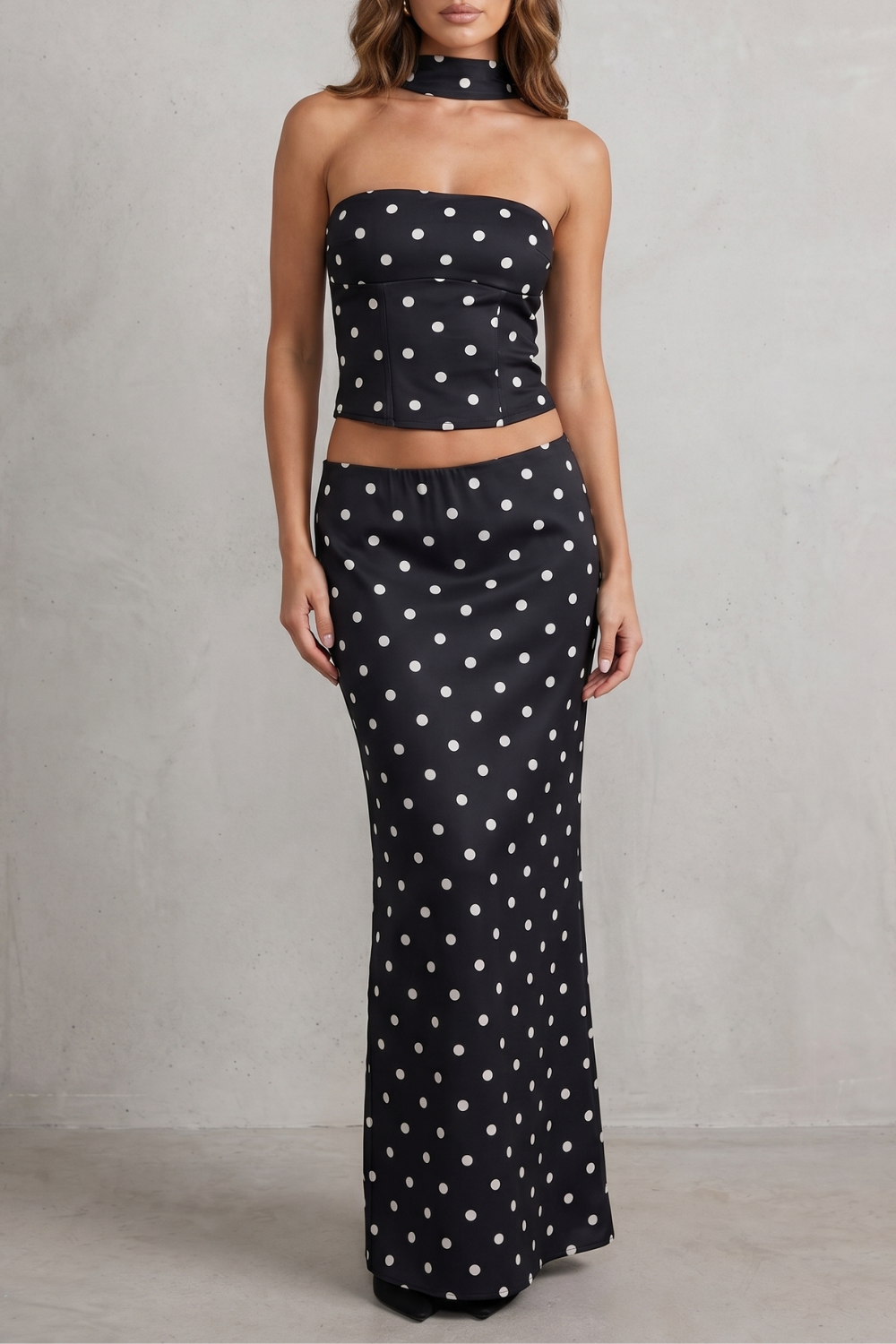 Women's polka dot strapless bandeau top and maxi skirt set, front view