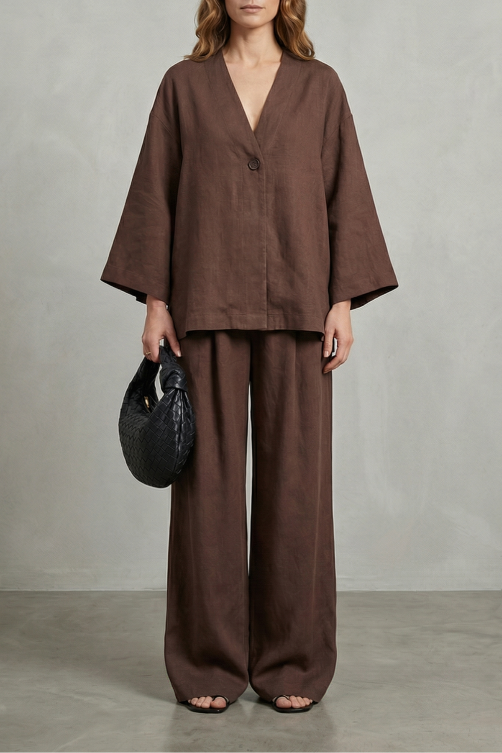 Women's wrap V-neck top and high-waisted wide-leg pants set, front view