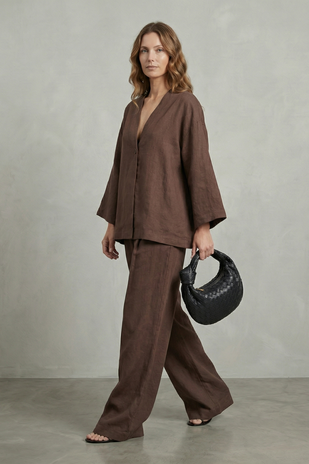 Back view of the wrap V-neck top and high-waisted wide-leg pants