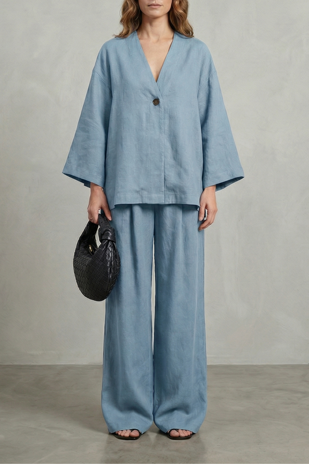 Light Blue colorway of the wrap top and wide-leg pants set, full-length view