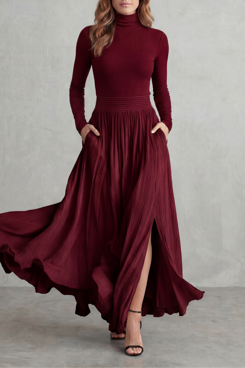 Gray colorway of the turtleneck and pleated maxi skirt set, full-length view