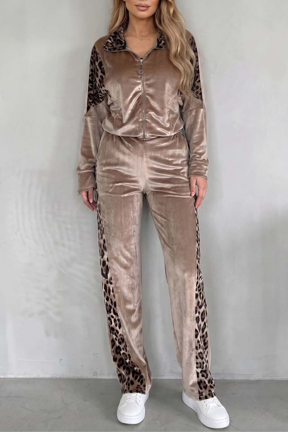 Women's leopard print three-piece athleisure set, front view with zip jacket, crop top and pants