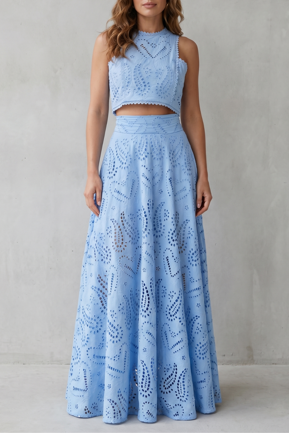 Women's sleeveless lace crop top and midi skirt set, front view