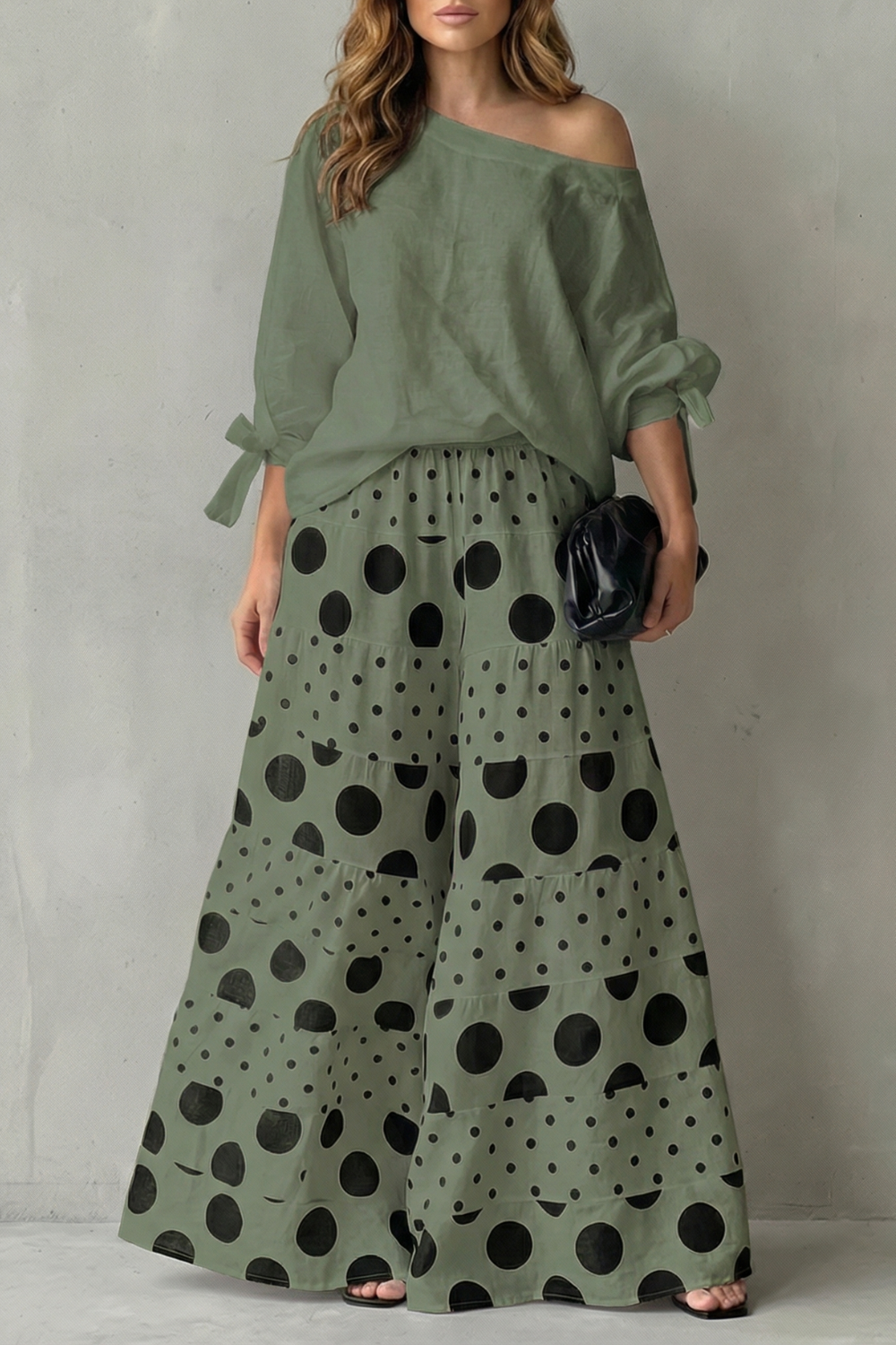 Green colorway of the polka dot top and wide-leg pants set, full-length view