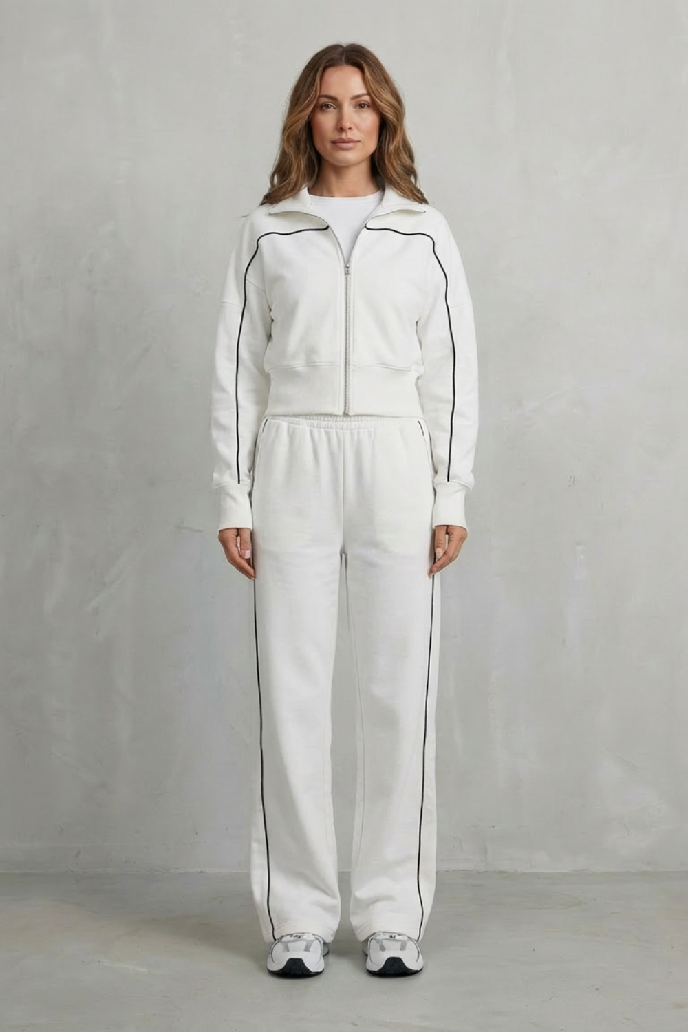 White colorway of the piped zip-up jacket and wide-leg pants set