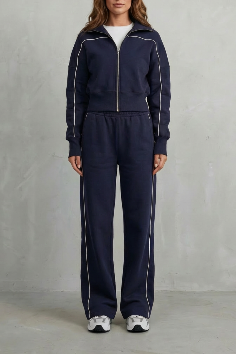 Savina set styled with sneakers and a crop top for an off-duty look