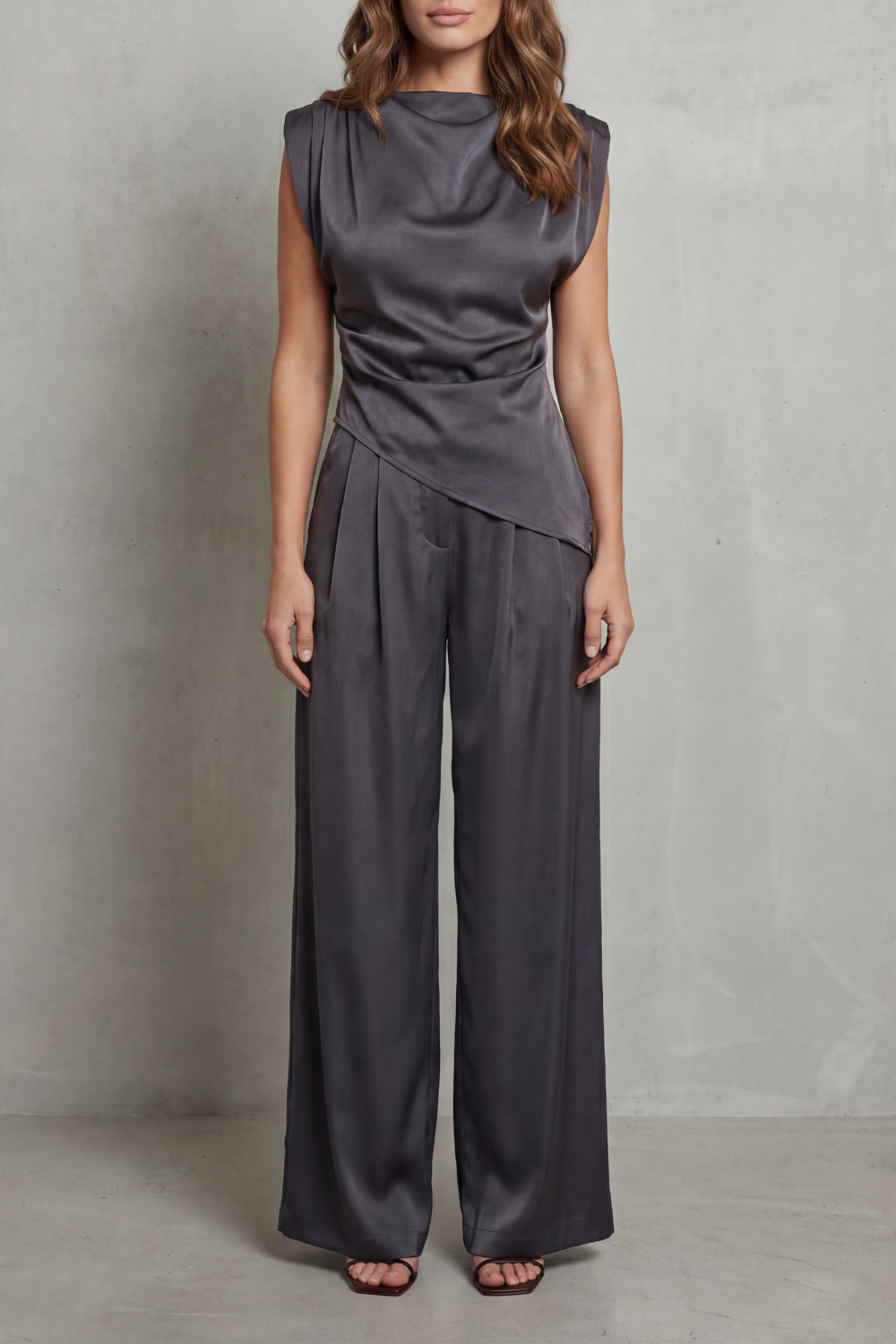 Women's sleeveless draped-waist top and wide-leg pants set, front view