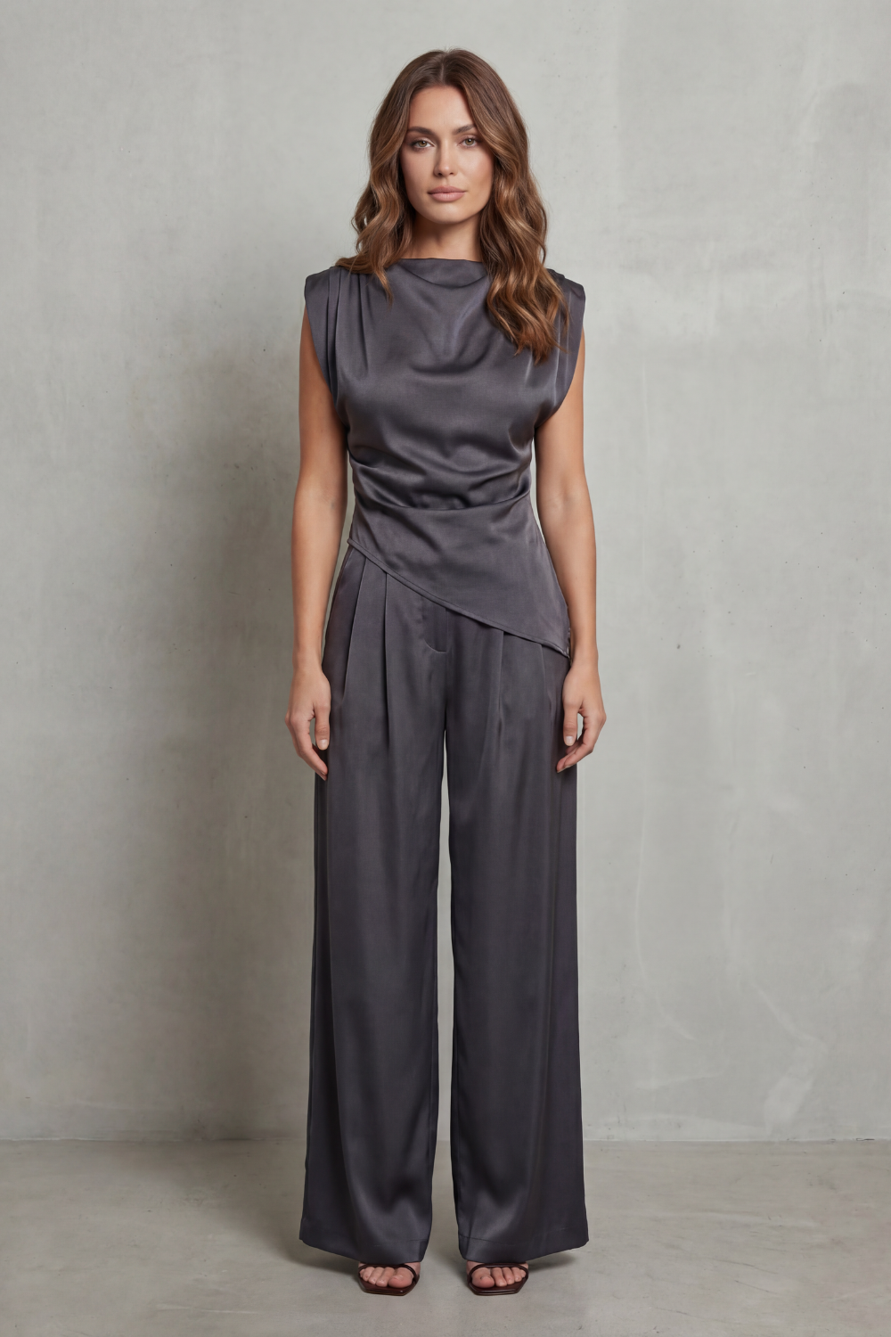 Side view of the draped-waist top and fluid wide-leg pants