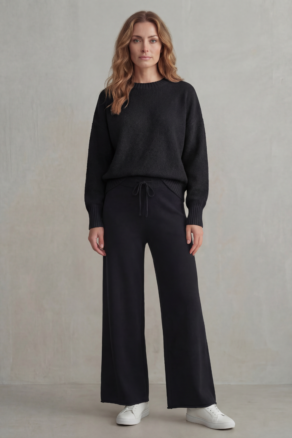 Lounge set styled with loafers and a crossbody bag