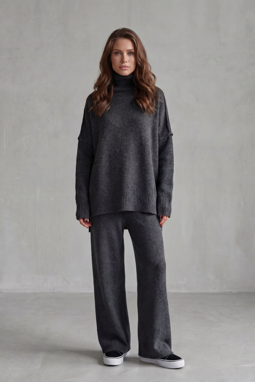 Side view of the oversized knit sweater and wide-leg knit pants