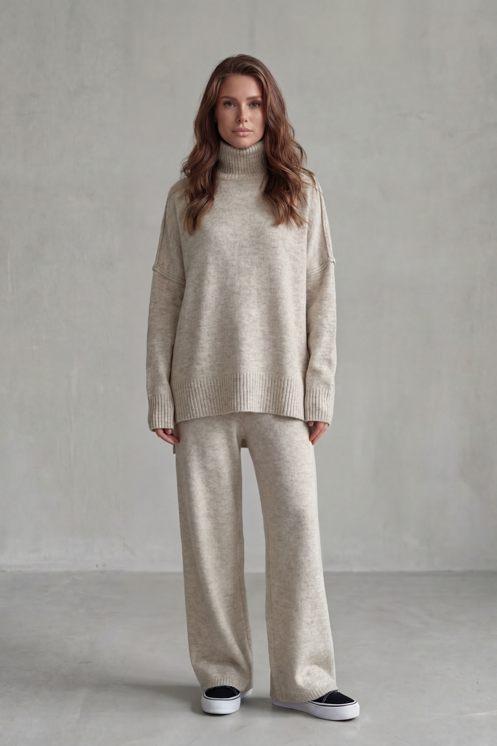 Brown colorway of the high-neck knit sweater and wide-leg pants