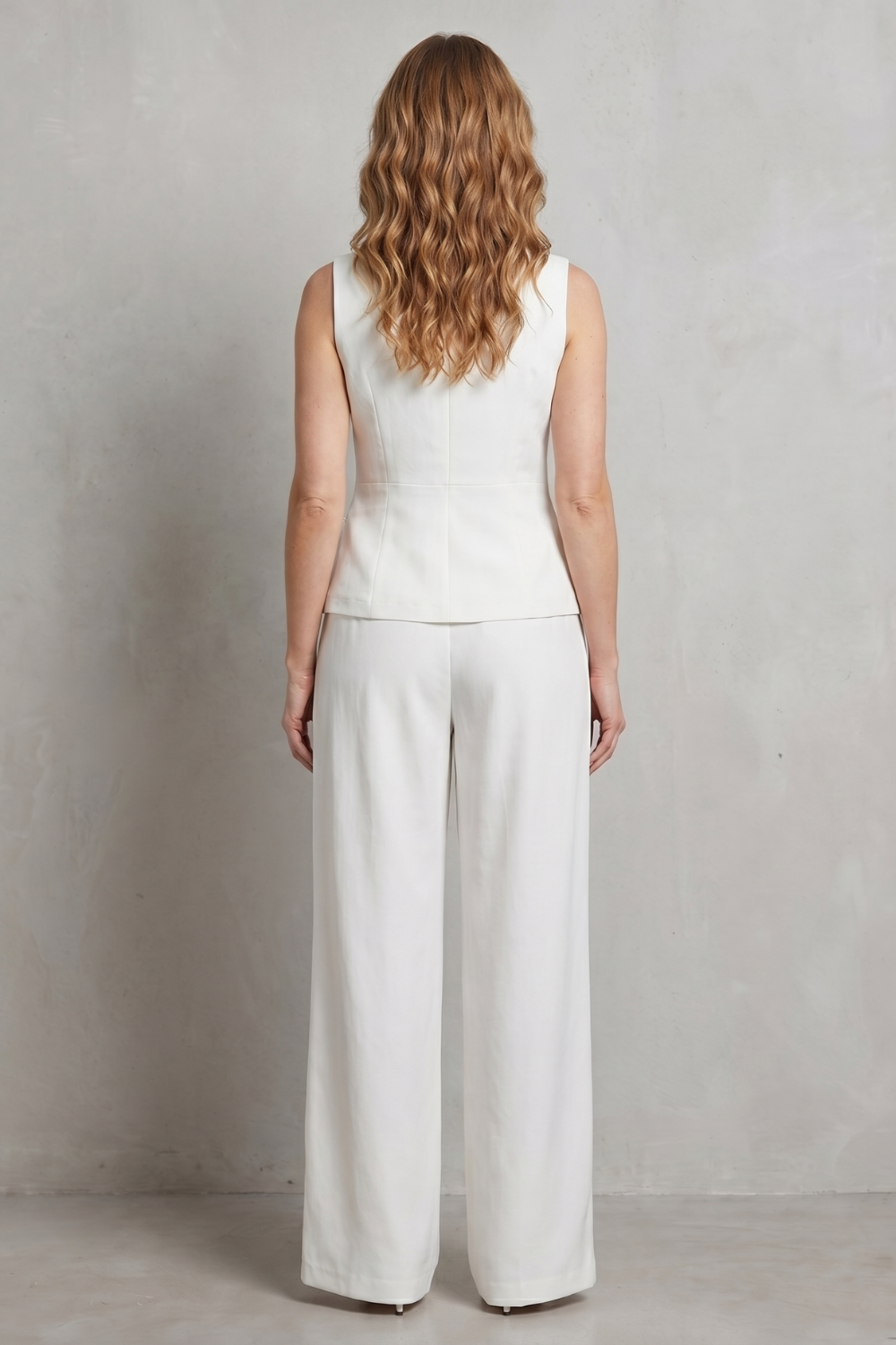 White colorway of the tailored vest and pants suit set, full-length view