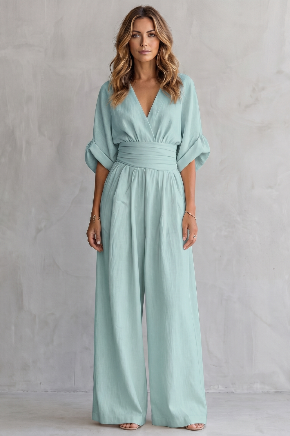 Pink colorway of the V-neck batwing jumpsuit, full-length view