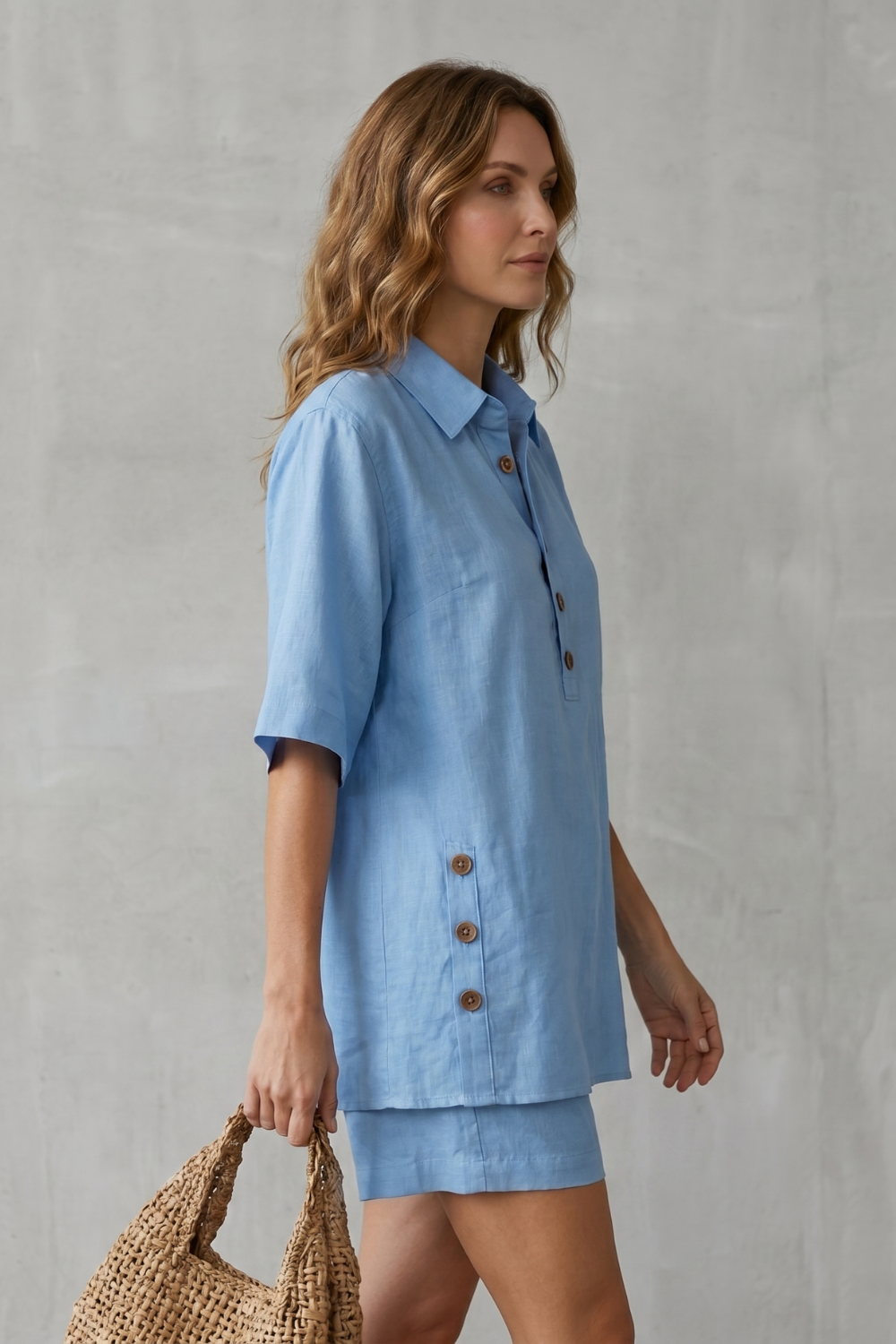 Back view of the two-piece button-front top and shorts set