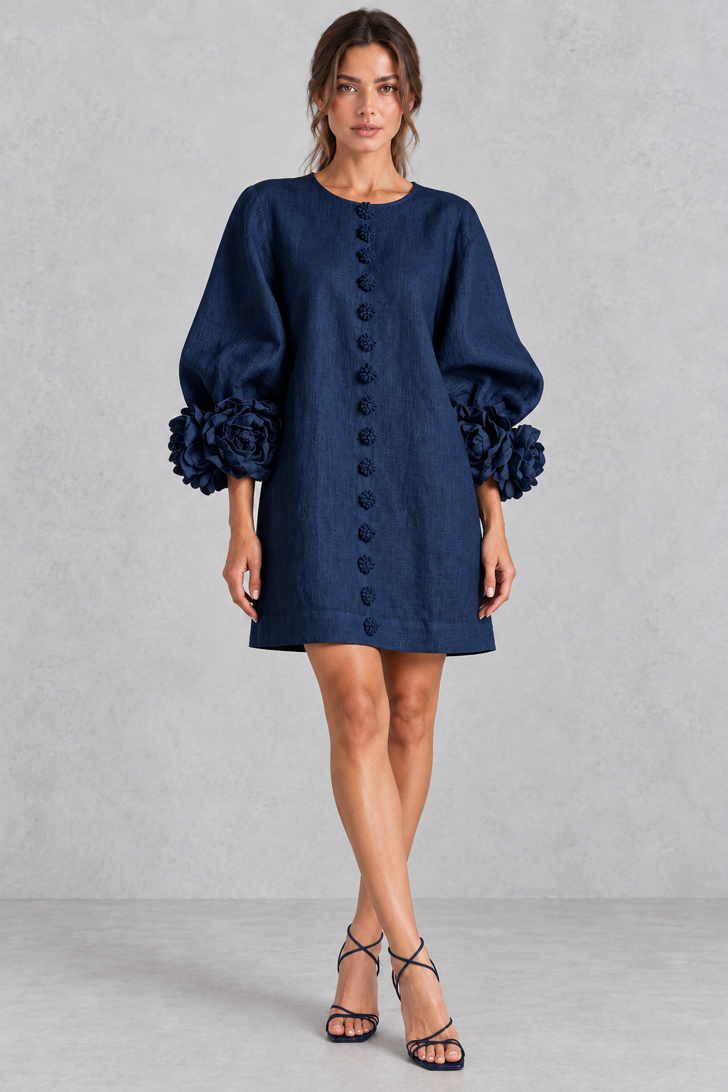 Relaxed-fit floral mini dress with long sleeves, a sweet pick for weekend brunch.