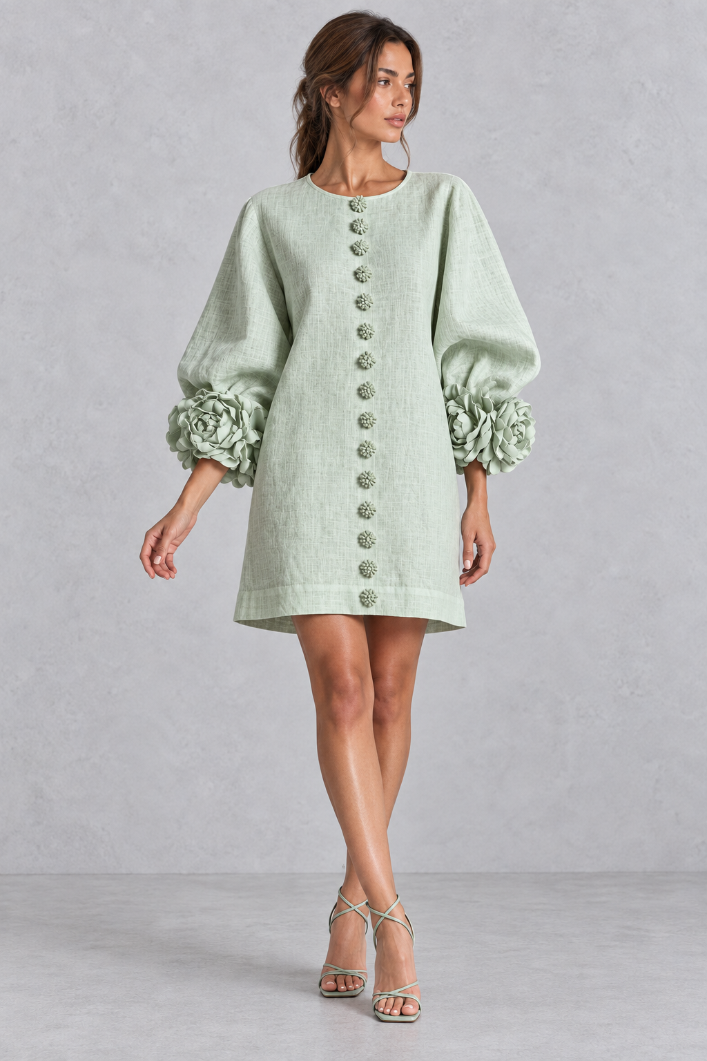 Back view of a cotton-linen A-line mini dress with long lantern sleeves.
