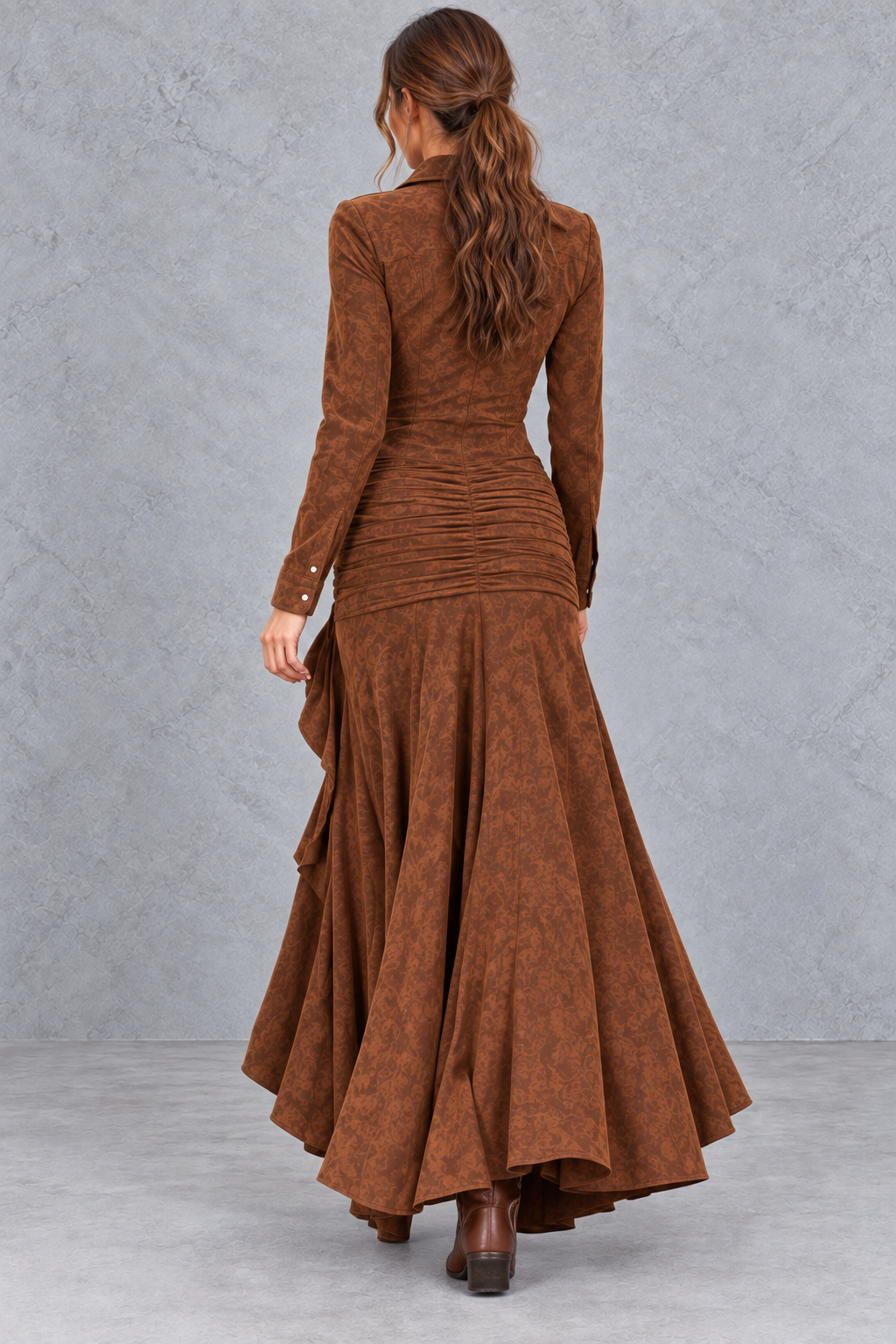 Back view of a women's flowing A-line long sleeve dress