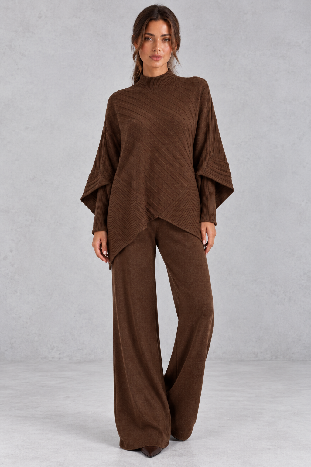 Women's ribbed knit sweater and wide leg pants set with asymmetric hem, front view