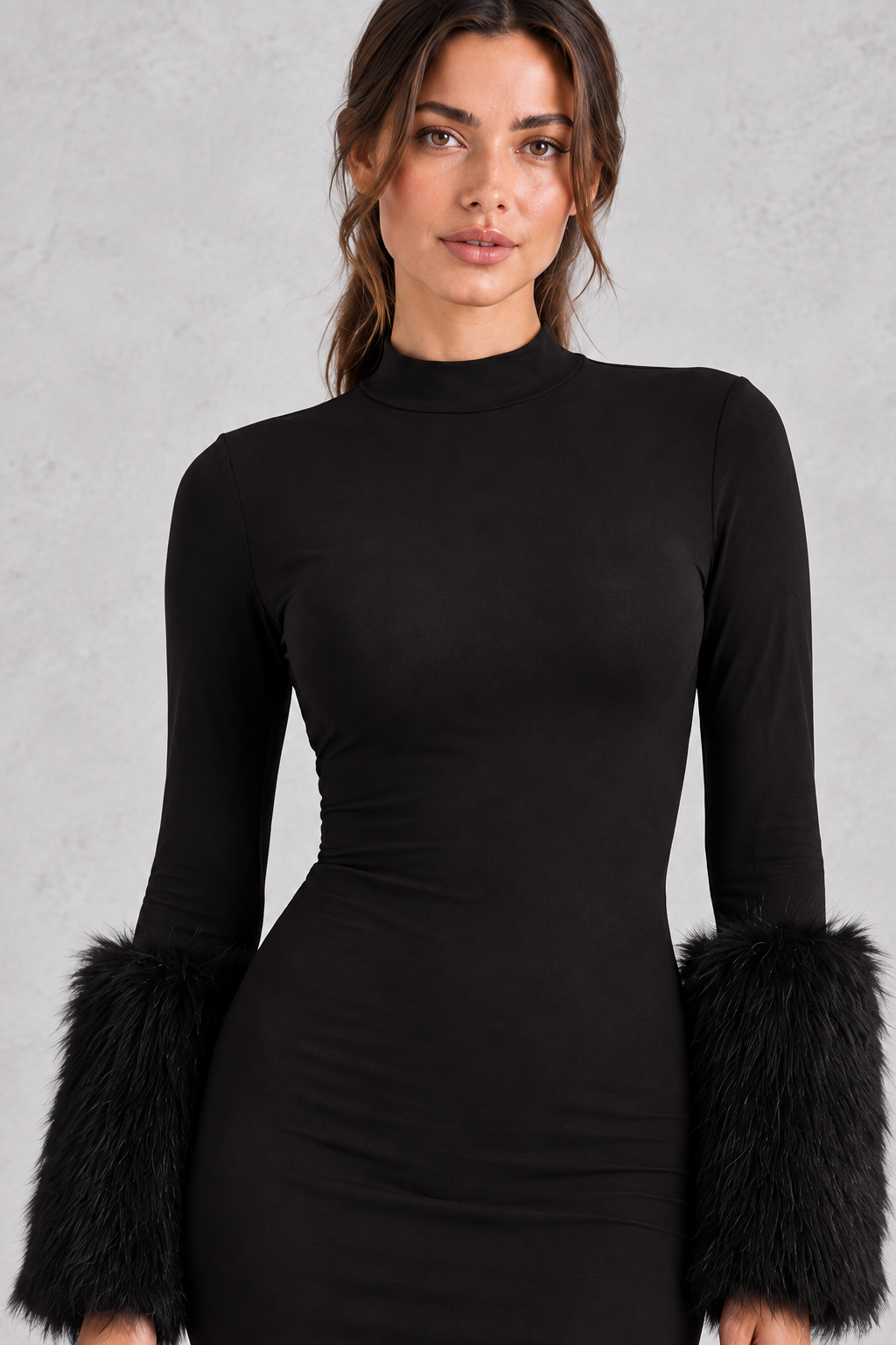 Black plush faux fur party dress in a sleek mini length, perfect for date night.