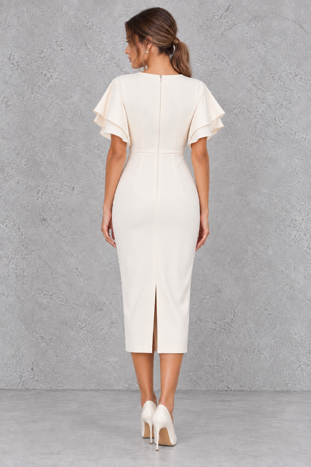 Back view of a women's midi pencil dress with zip closure, great for business lunches.