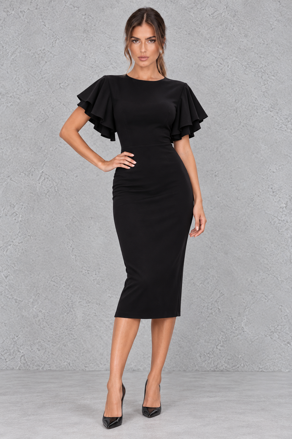 Model styling a check sleeve pencil dress with heels for dinner and date night.