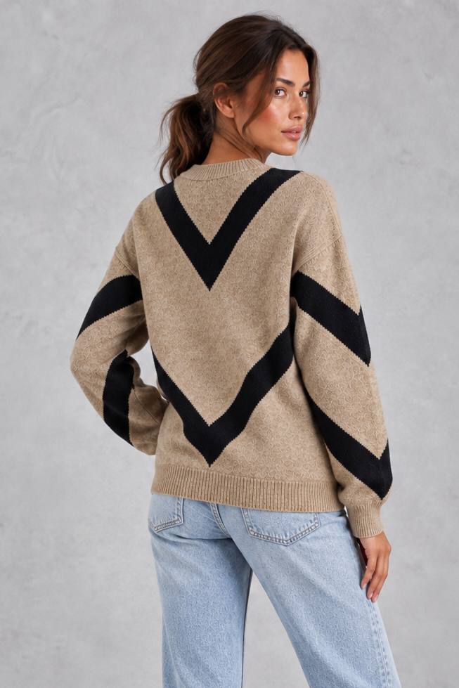 Detail of ribbed crew neckline and dropped shoulder