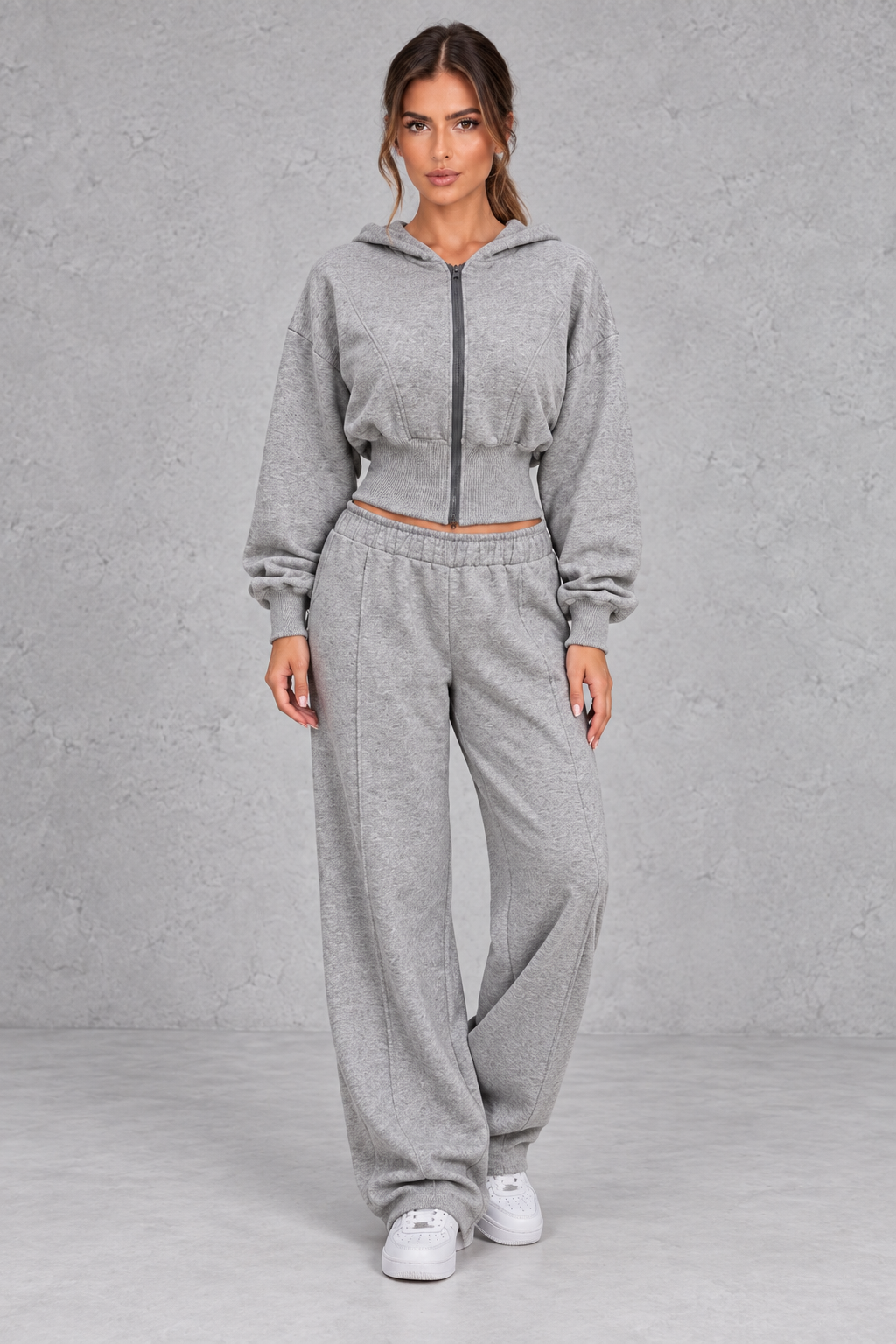 Women's gray cinched waist zip hoodie and wide leg jogger set, front view