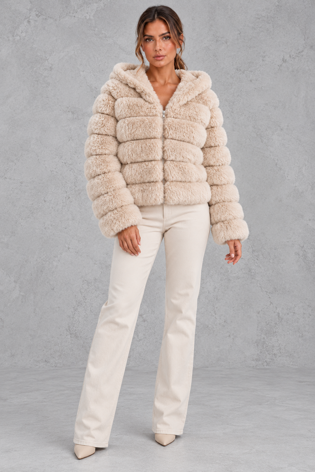 Cropped faux fur jacket styled with a dress for a holiday party